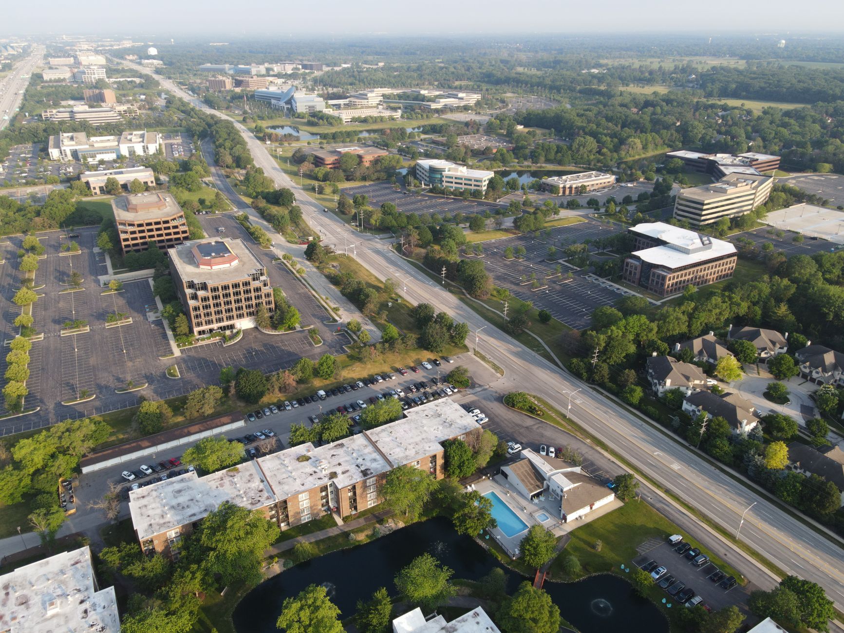 Vast green undeveloped land parcels in American suburbs with